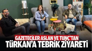 Gazeteciler Aslan ve Tun&ccedil;&rsquo;tan T&uuml;rkan&rsquo;a tebrik ziyareti